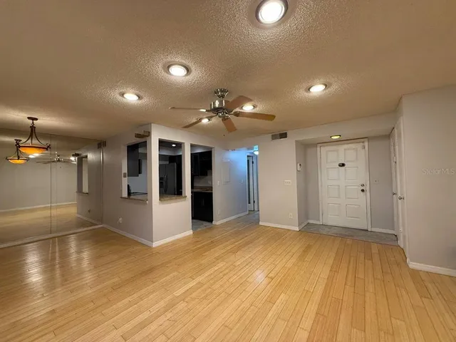 en empty room with windows