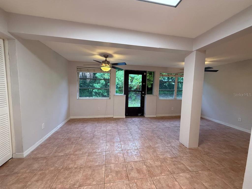 1217 McMullen Booth Road Clearwater, FL 33759 - Photo 9 of 44 en empty room with windows