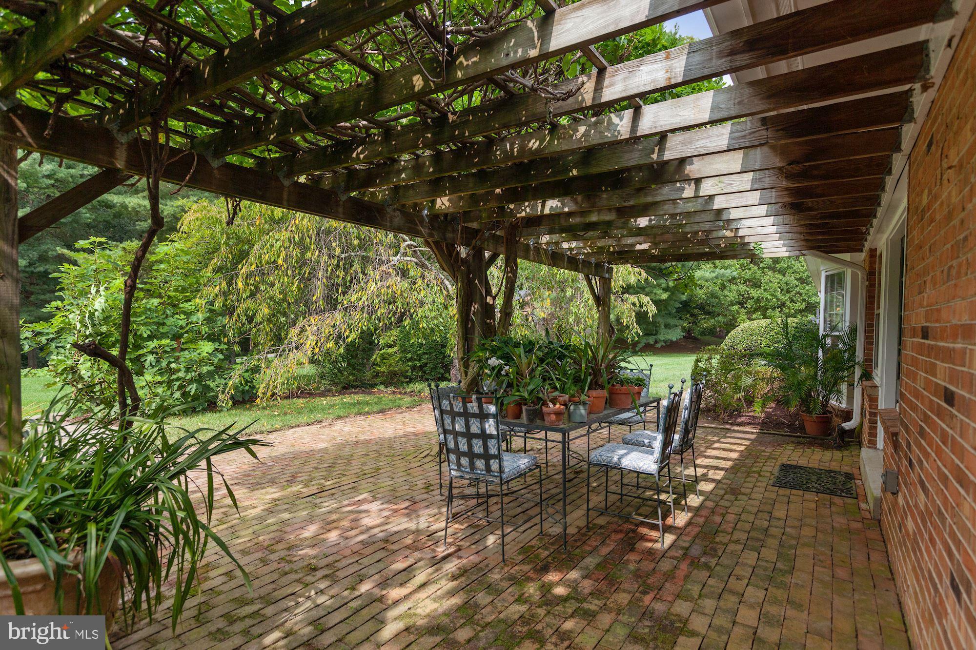 11009 Cripplegate Road Potomac, MD 20854 - Photo 2 of 18 Back covered terrace