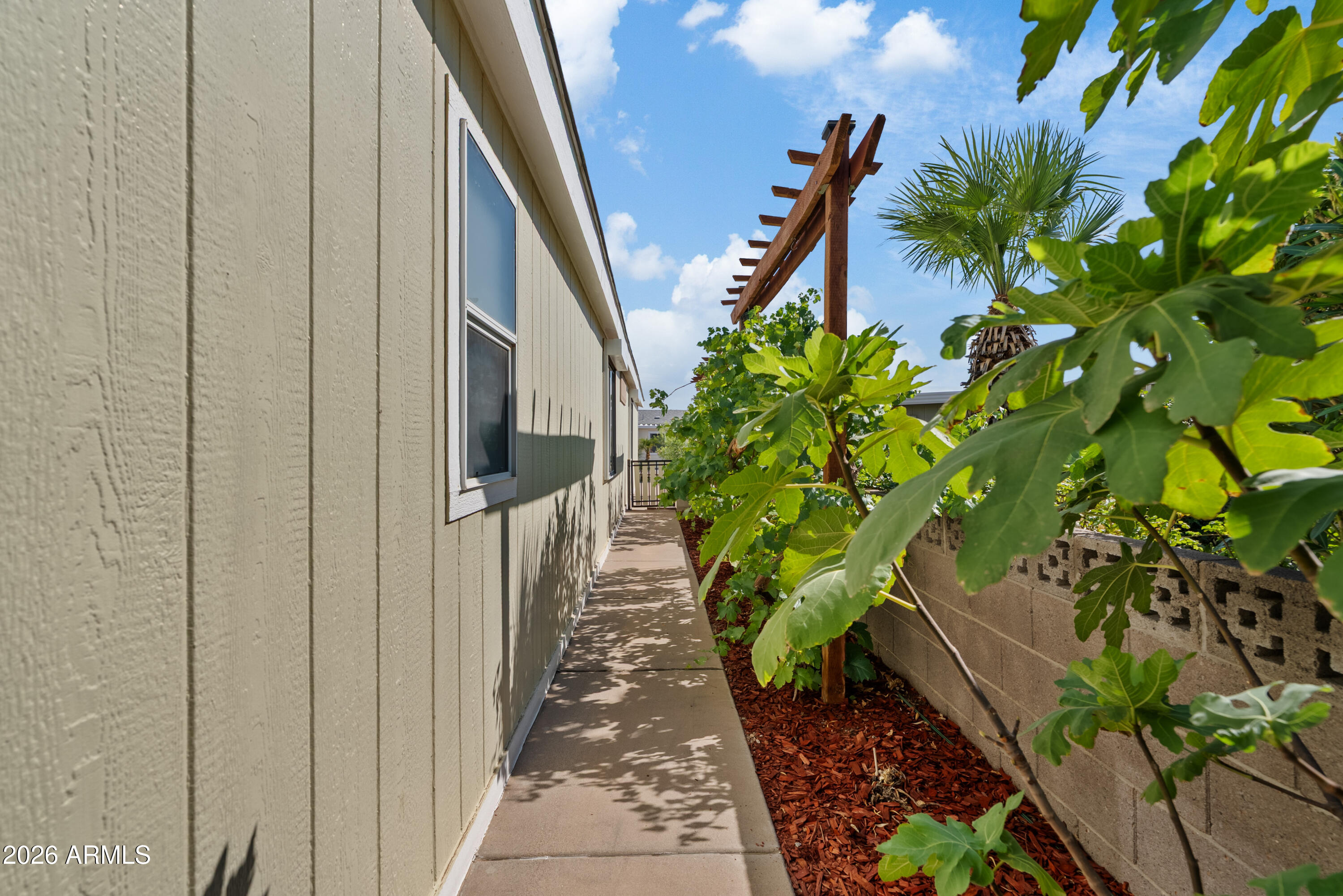 3700 South Tomahawk Road, Unit 8 Apache Junction, AZ 85119 - Photo 19 of 30 Side Yard