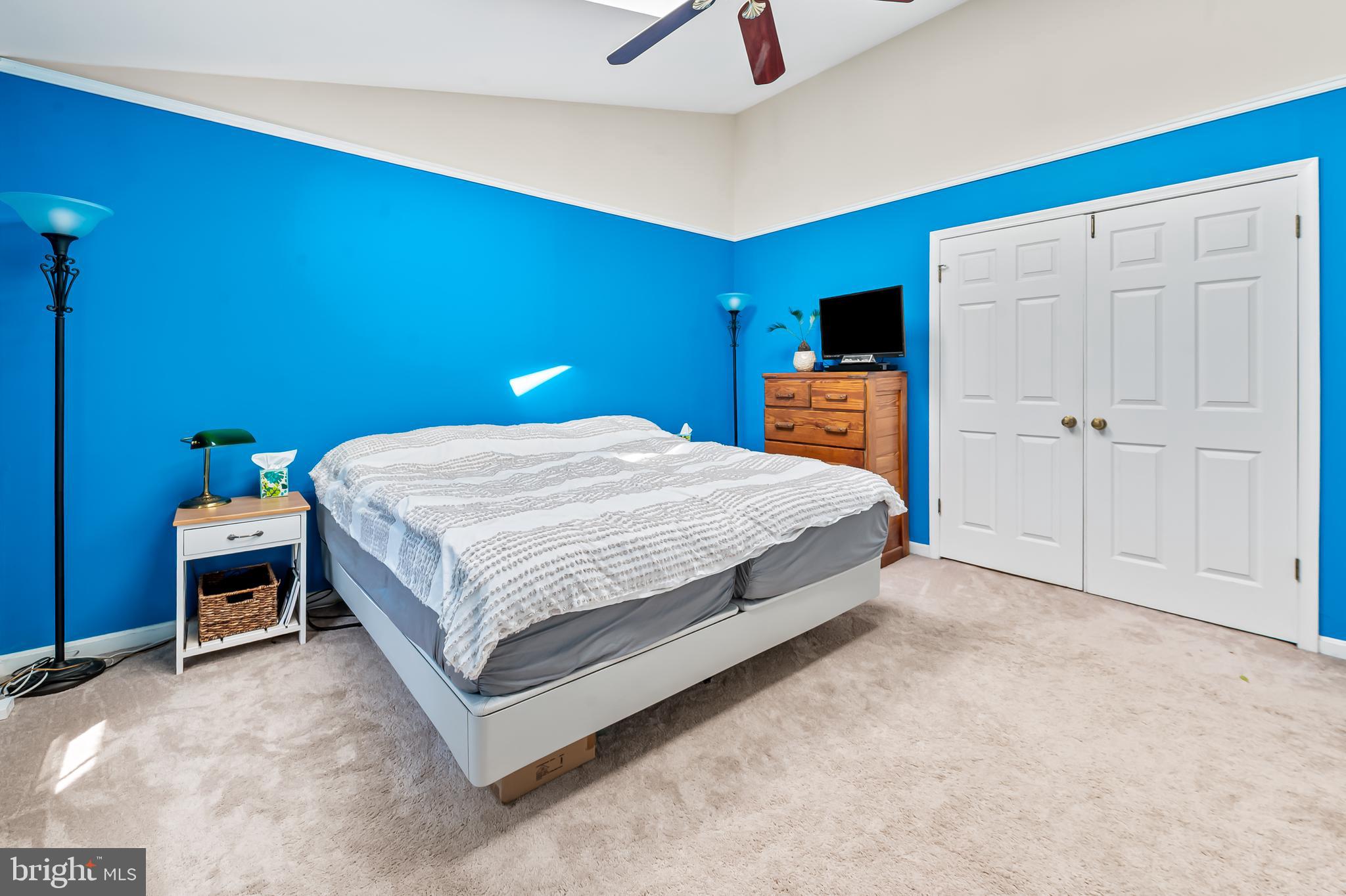 167 Spring Pl Way Annapolis, MD 21401 - Photo 20 of 38 a bedroom with a bed and a view of bathroom