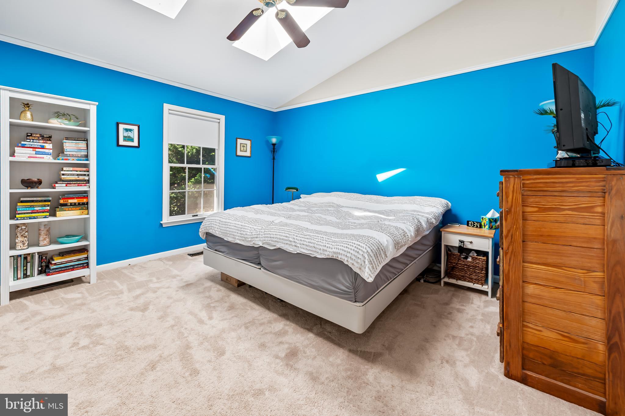 167 Spring Pl Way Annapolis, MD 21401 - Photo 21 of 38 a bedroom with a bed and a dresser