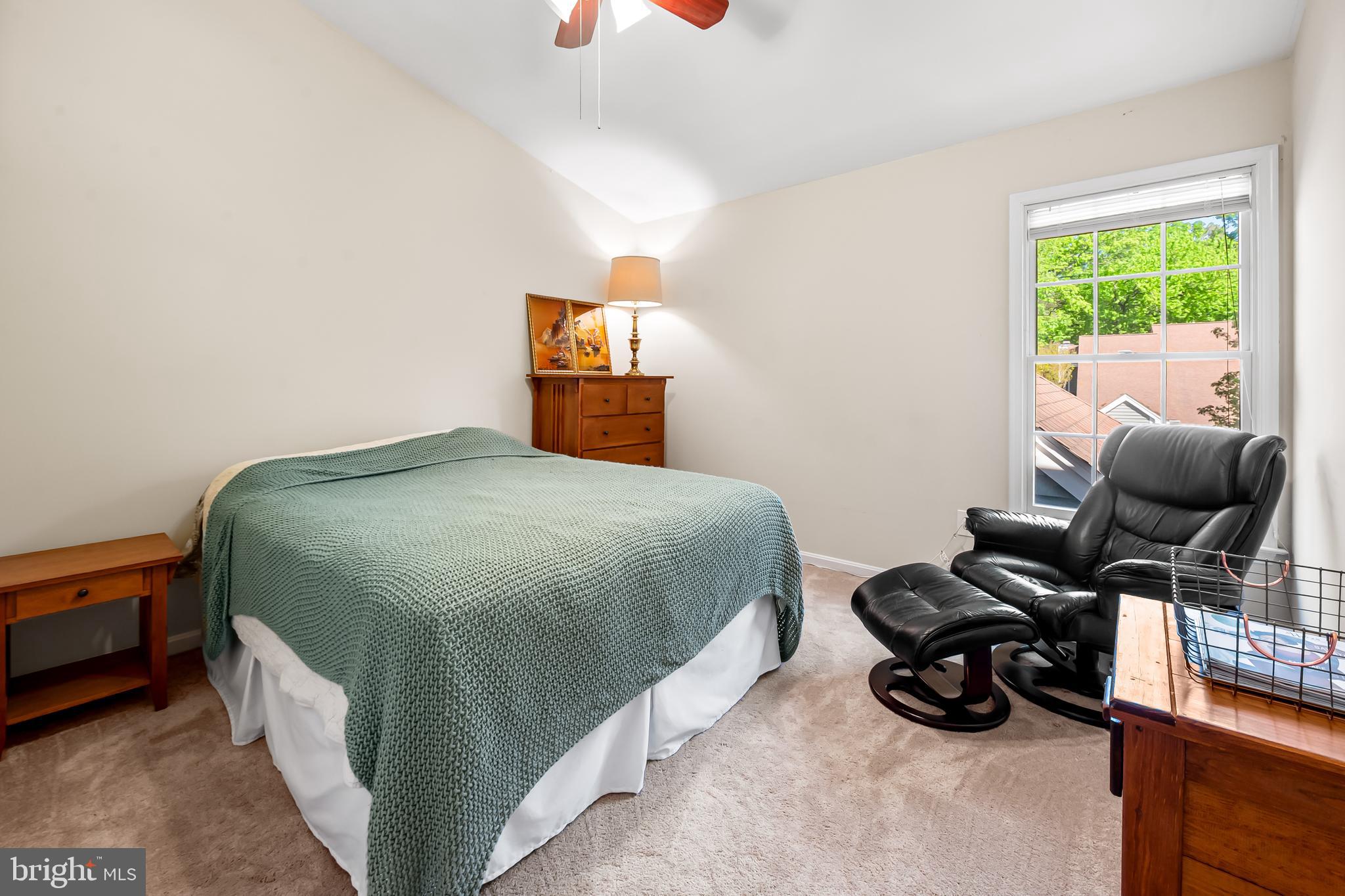 167 Spring Pl Way Annapolis, MD 21401 - Photo 24 of 38 a bedroom with a bed and a window