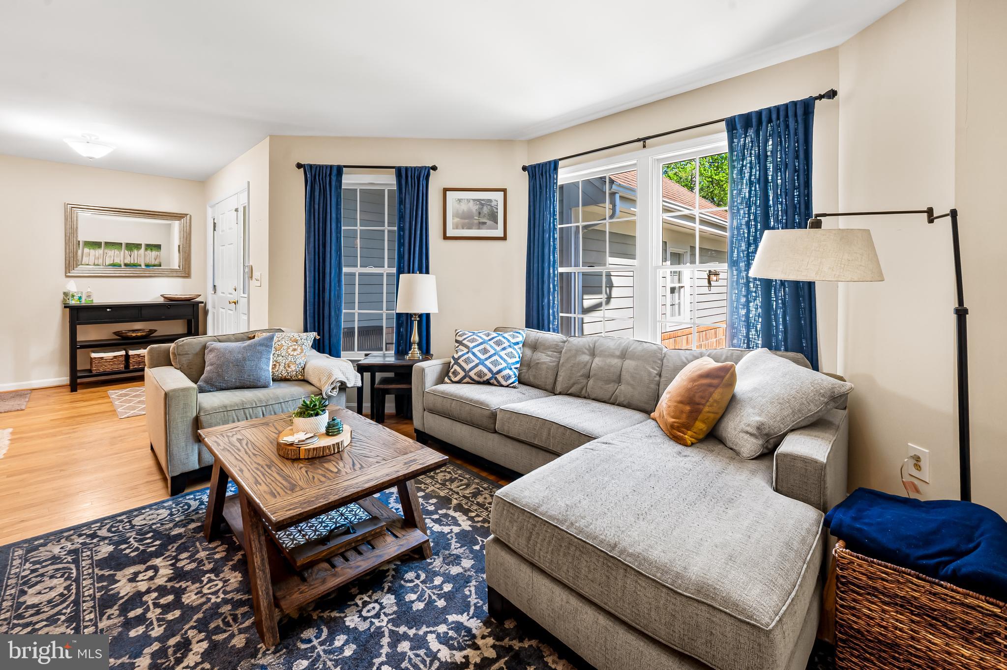 167 Spring Pl Way Annapolis, MD 21401 - Photo 4 of 38 a living room with furniture ceiling fan and a window
