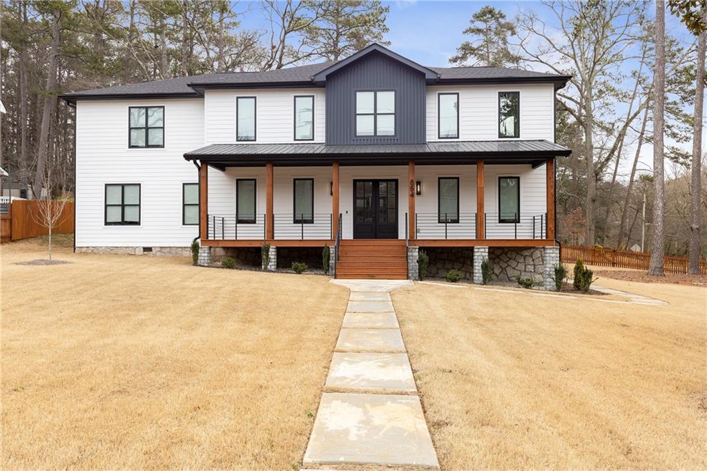 854 South Candler Street Decatur, GA 30030 - Photo 1 of 1 a front view of a house with a yard