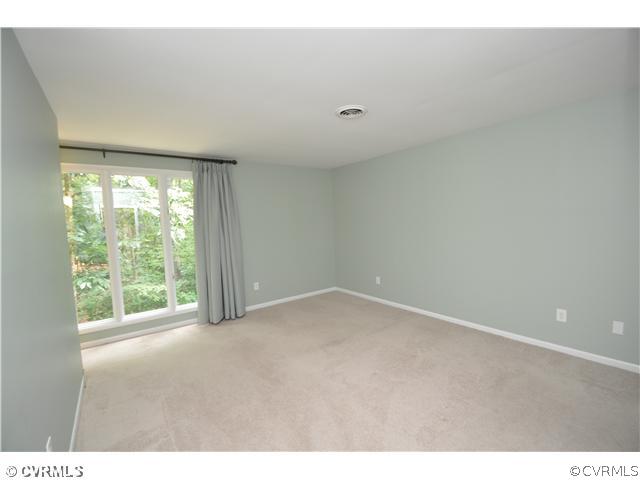 13804 Winterberry Ridge Midlothian, VA 23112 - Photo 7 of 12 a view of an empty room with a window