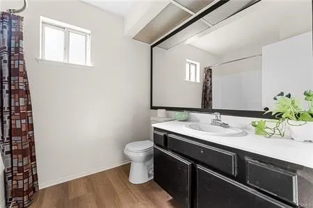 a dining hall with a sink and a mirror