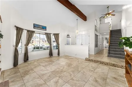 a view of entryway with stair