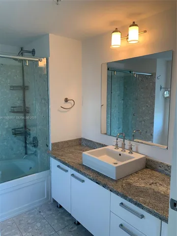 a view of room with a hallway