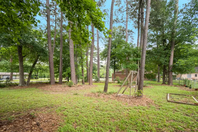 a view of a park with swings