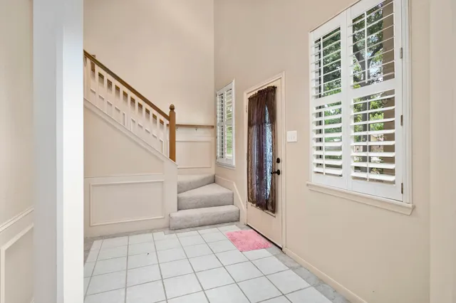 a living room with a couch and a table