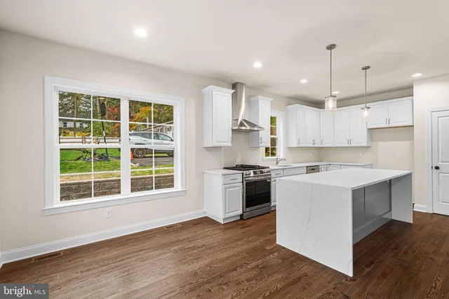 a view of livingroom with furniture wooden floor and window