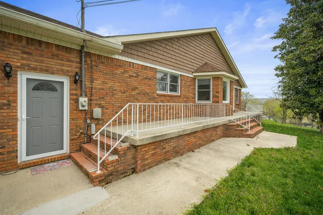 a view of a house with a roof deck