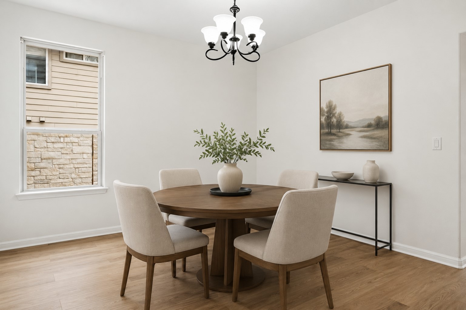 304 Santa Maria Street Georgetown, TX 78628 - Photo 9 of 37 A well-lit dining area featuring a classic chandelier and durable flooring. Virtually Staged.