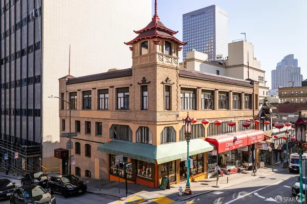 a front view of building with street