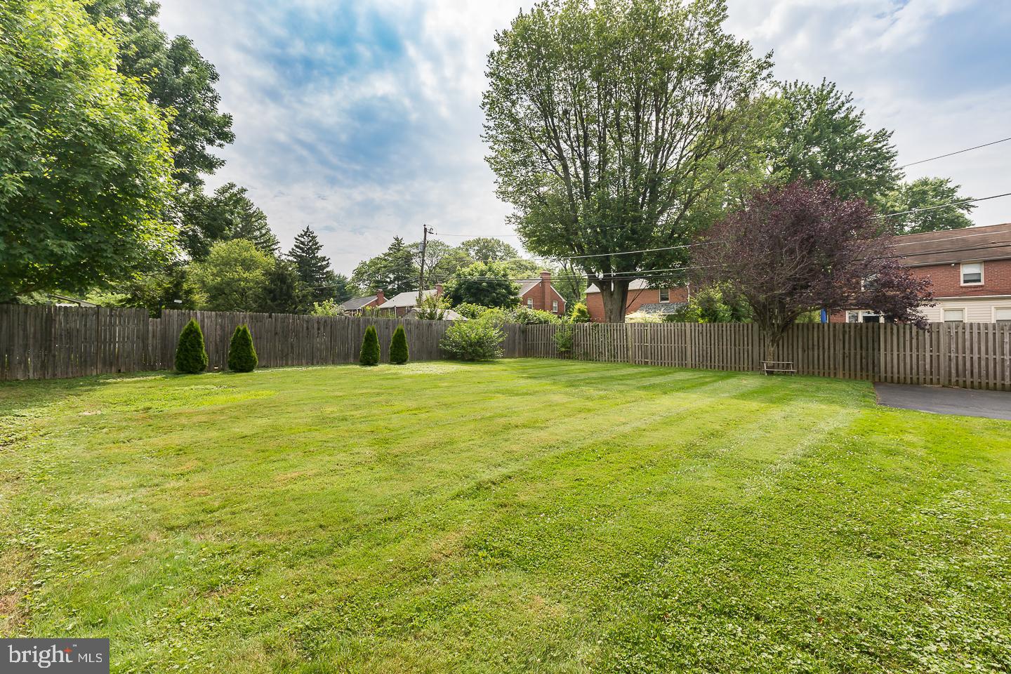 339 East Spring Avenue Ardmore, PA 19003 - Photo 40 of 44 a swimming pool with outdoor seating and yard