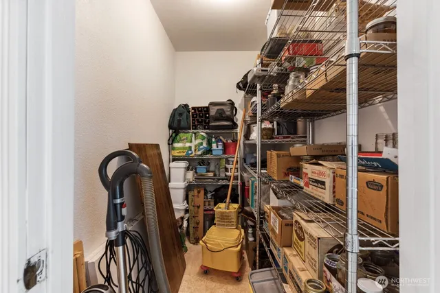 a view of a closet with storage