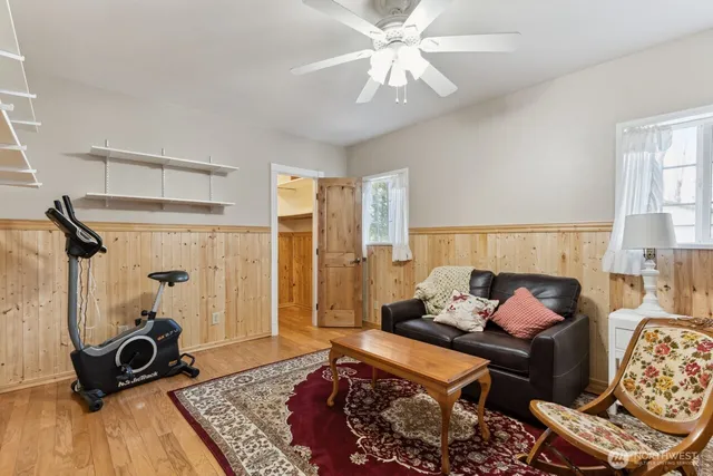 a living room with furniture and a rug