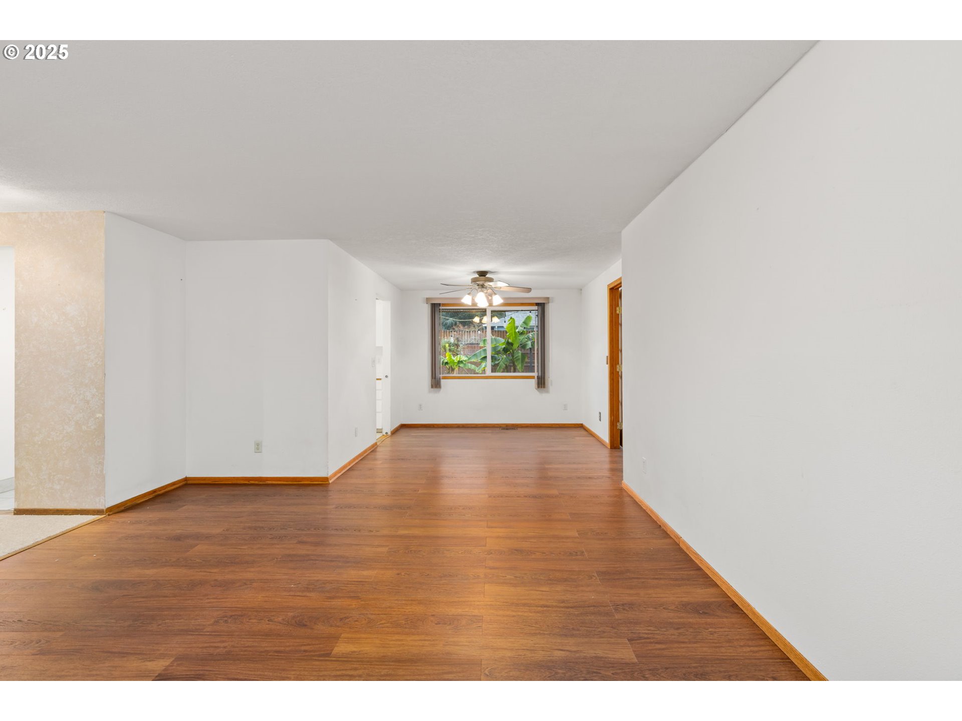 17130 Southwest Baker Street Beaverton, OR 97007 - Photo 11 of 37 a view of an empty room and window