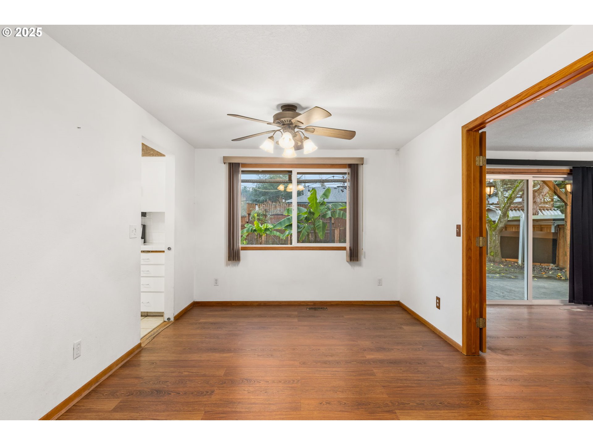 17130 Southwest Baker Street Beaverton, OR 97007 - Photo 13 of 37 a view of an empty room with a window