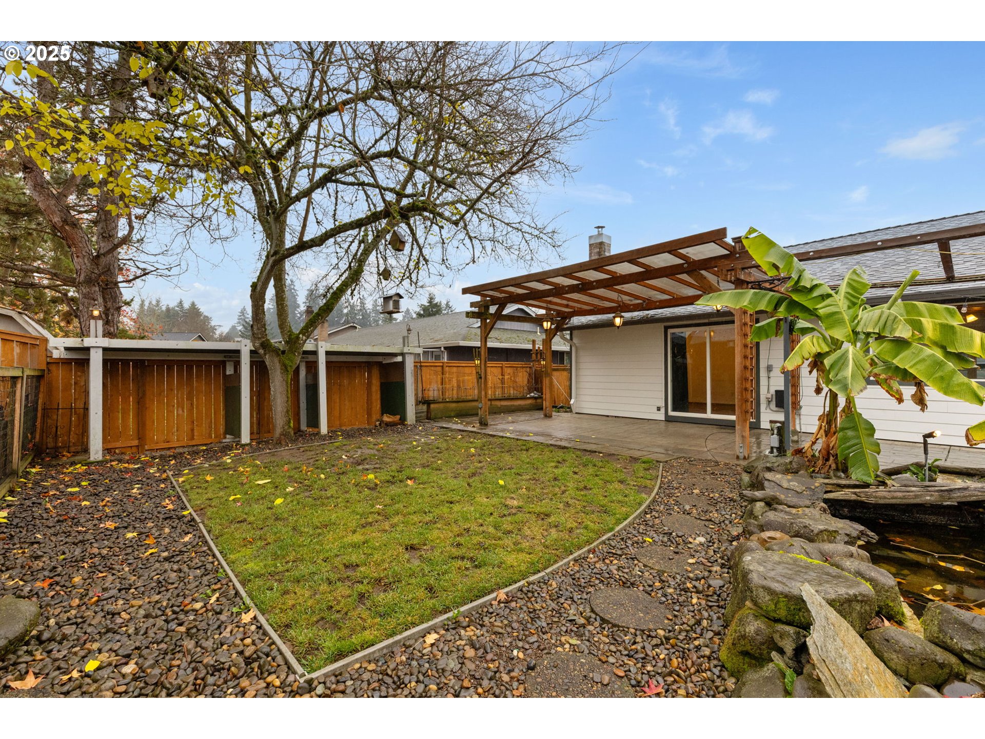 17130 Southwest Baker Street Beaverton, OR 97007 - Photo 30 of 37 a view of a house with a patio
