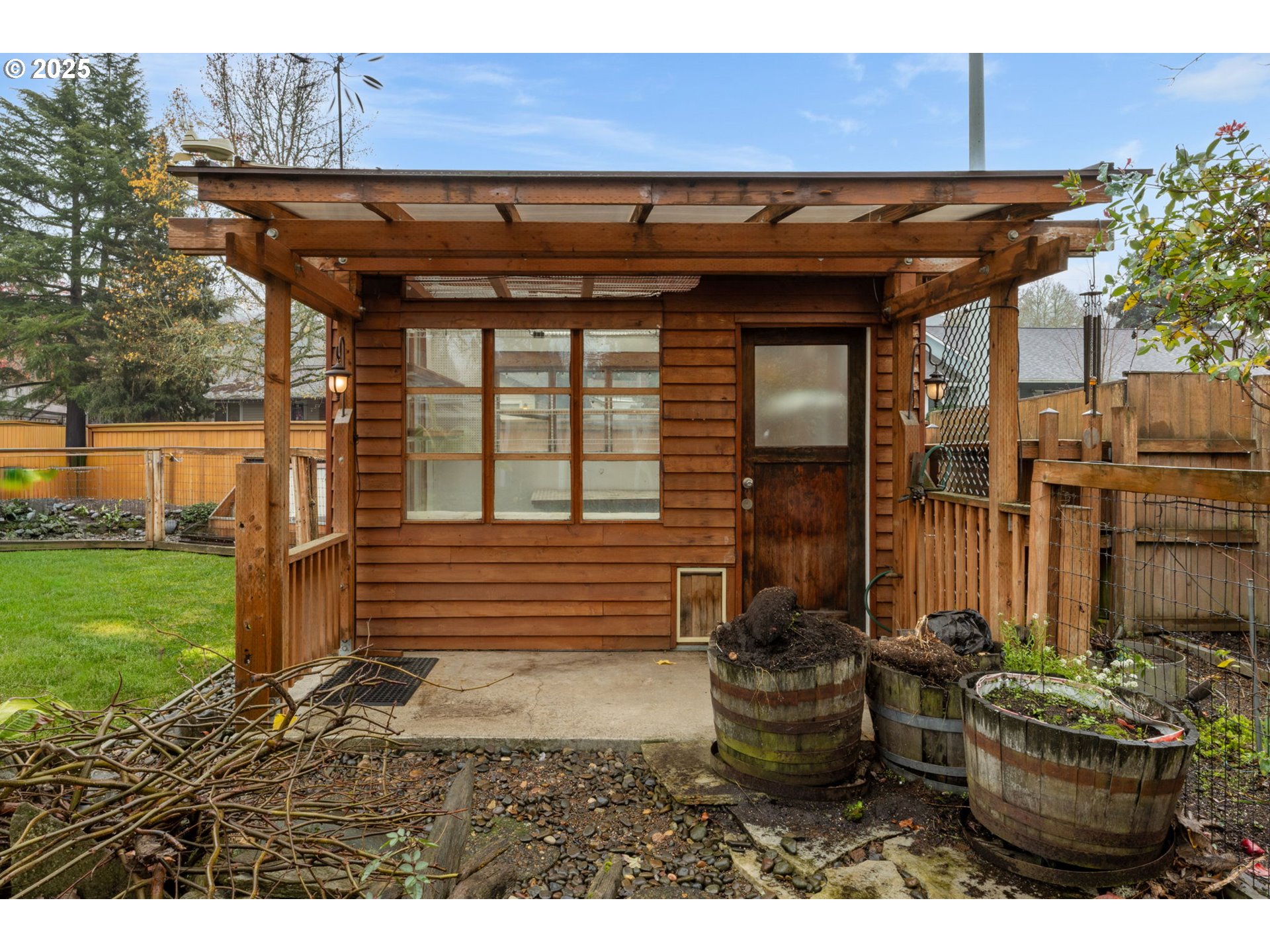17130 Southwest Baker Street Beaverton, OR 97007 - Photo 35 of 37 a front view of a house with a garden