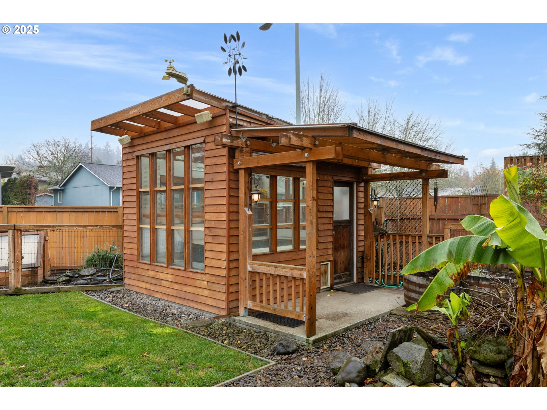 17130 Southwest Baker Street Beaverton, OR 97007 - Photo 37 of 37 a front view of a house with garden