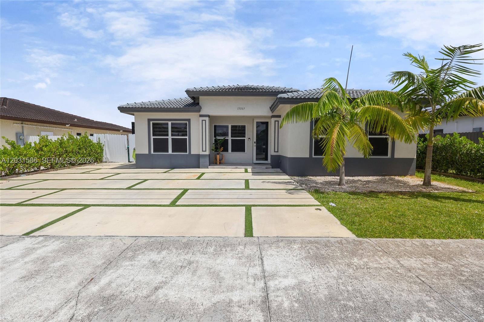 13063 Southwest 256th Street Homestead, FL 33032 - Photo 1 of 36