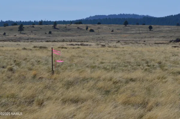 a view of ocean with sunset