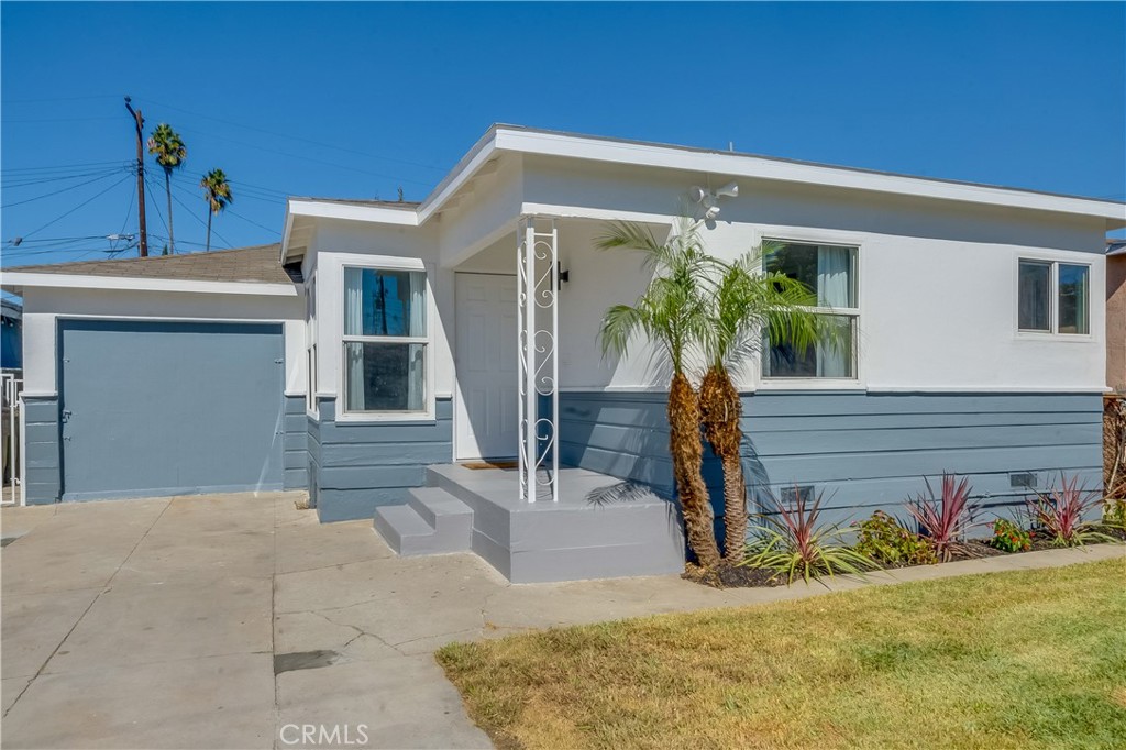 1347 East Bennett Street Compton, CA 90221 - Photo 30 of 31 a front view of a house with garden