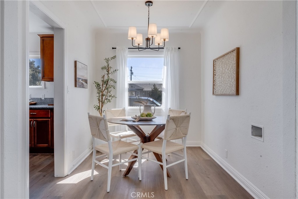 1347 East Bennett Street Compton, CA 90221 - Photo 8 of 31 a view of a dining room with furniture window and outside view