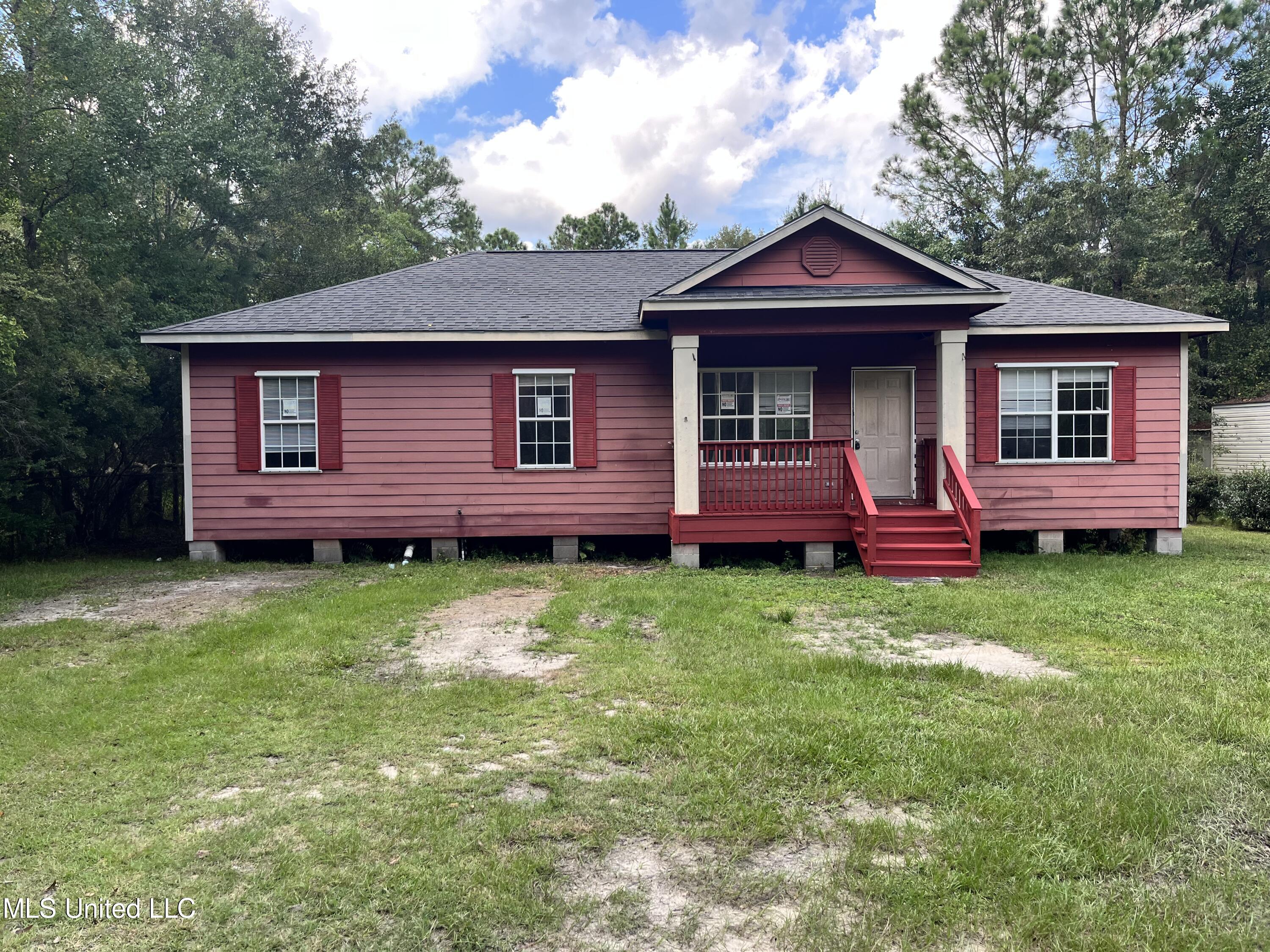 2032 Laurelglen Road Gautier, MS 39553 - Photo 1 of 12 20A67947-158C-4E01-8D28-027DE6268D32