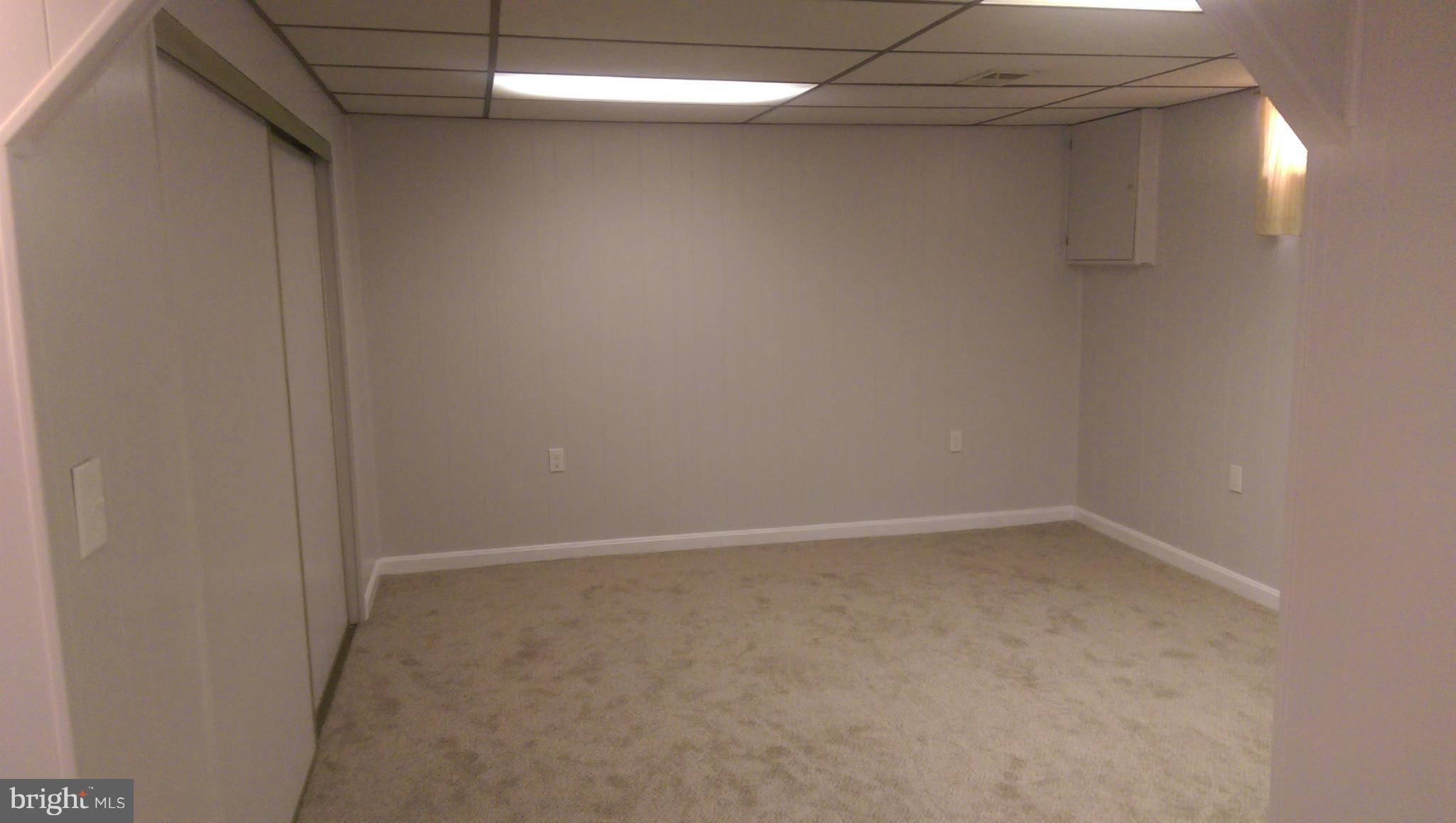 8701 Goldenwood Road Baltimore, MD 21237 - Photo 22 of 28 a view of an empty room