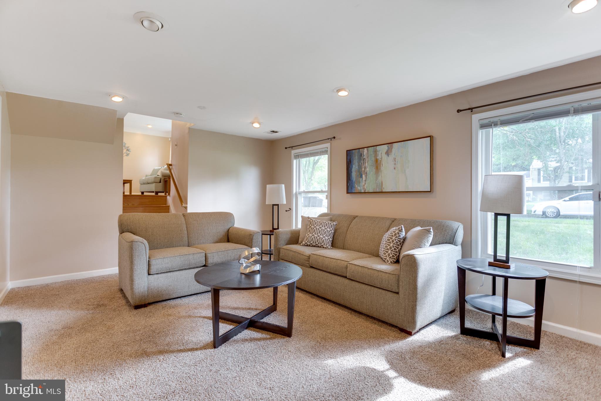 9010 Ridge Drive Fort Washington, MD 20744 - Photo 13 of 35 Lower level rec room with fireplace