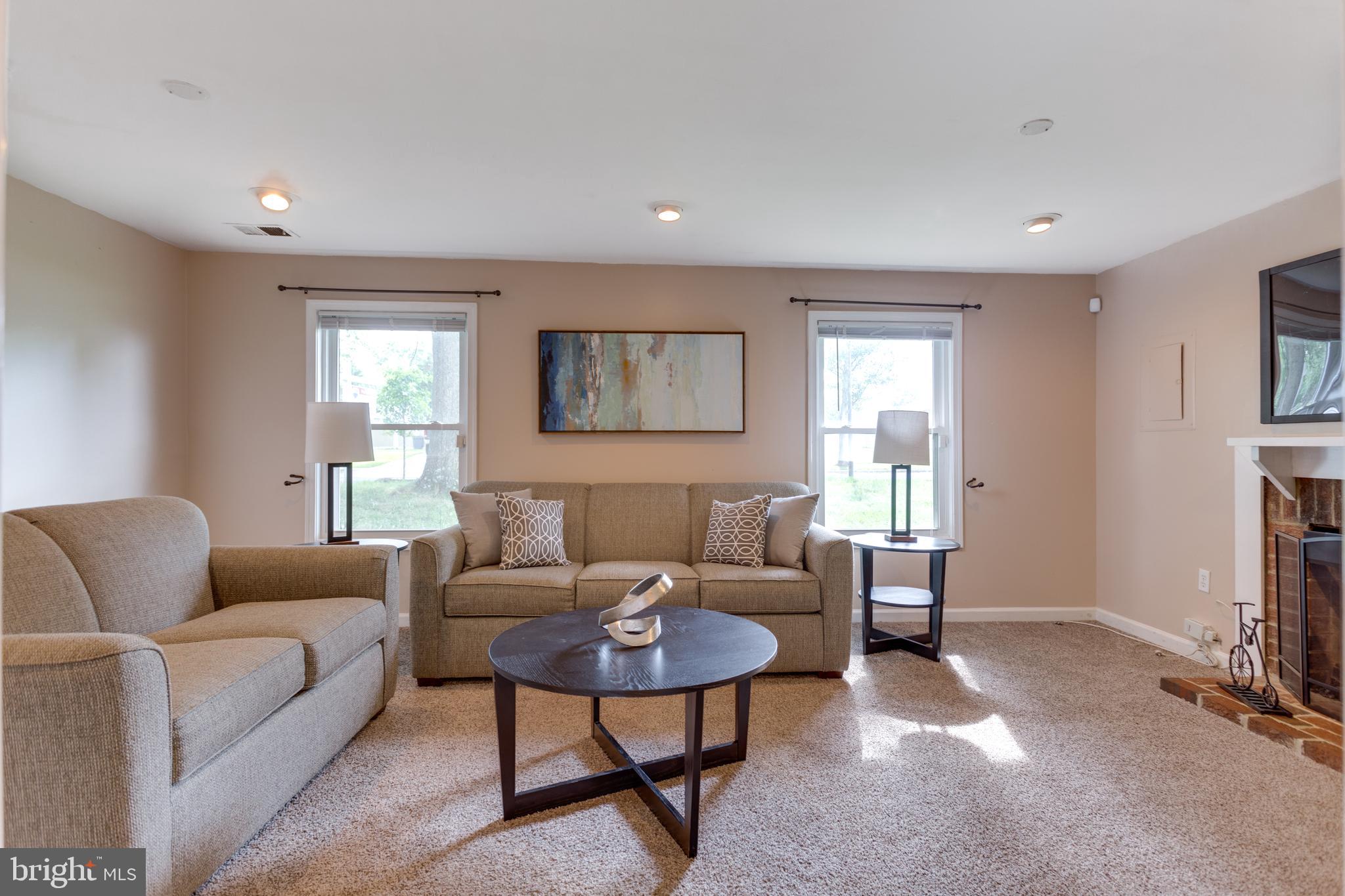 9010 Ridge Drive Fort Washington, MD 20744 - Photo 14 of 35 Lower level rec room with ample lighting