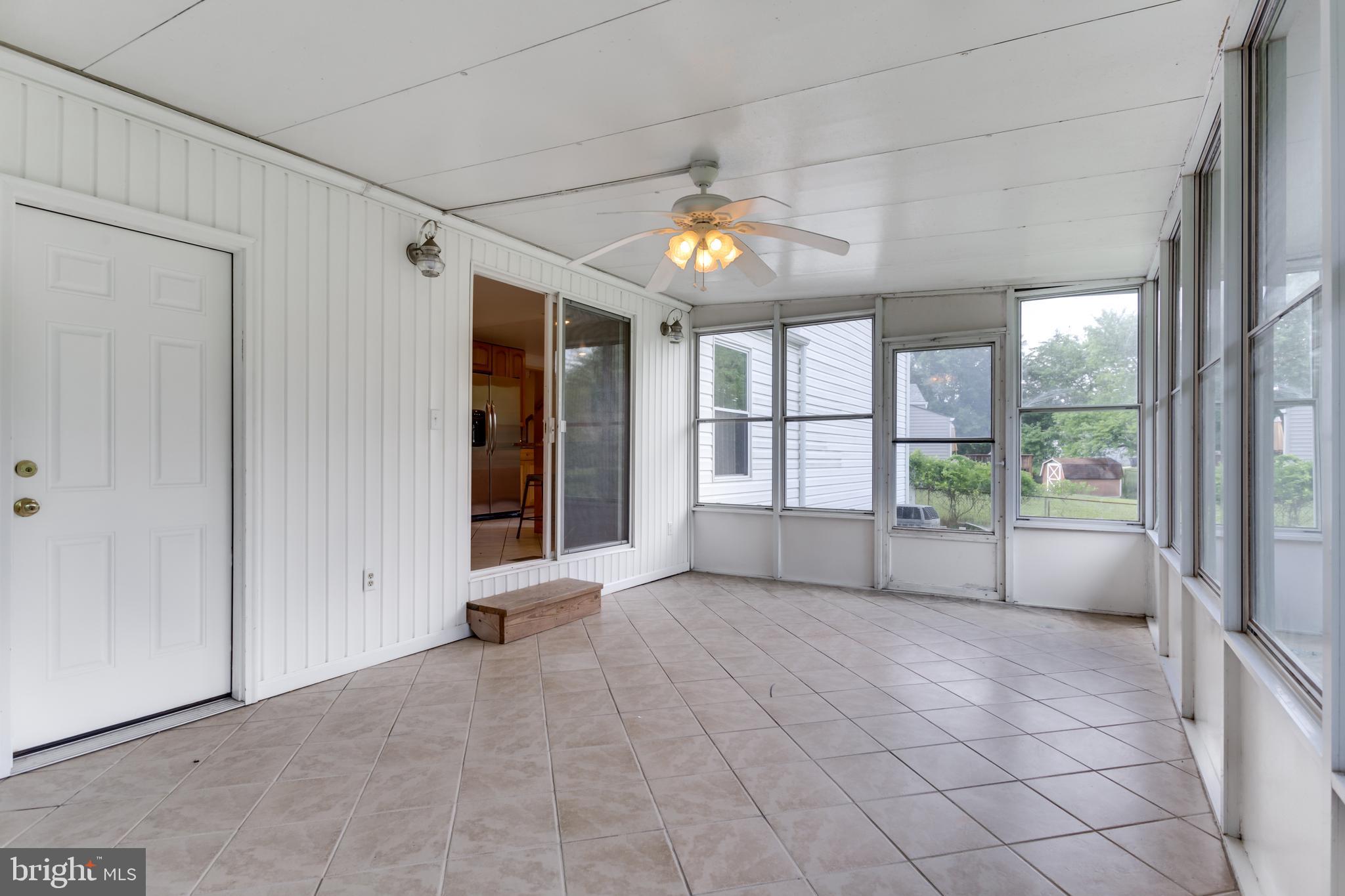 9010 Ridge Drive Fort Washington, MD 20744 - Photo 29 of 35 Sun room with vinyl flooring