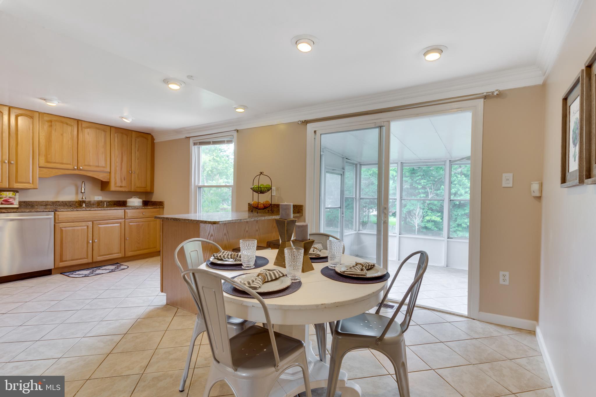 9010 Ridge Drive Fort Washington, MD 20744 - Photo 8 of 35 Dining area with slider to Sun room addition