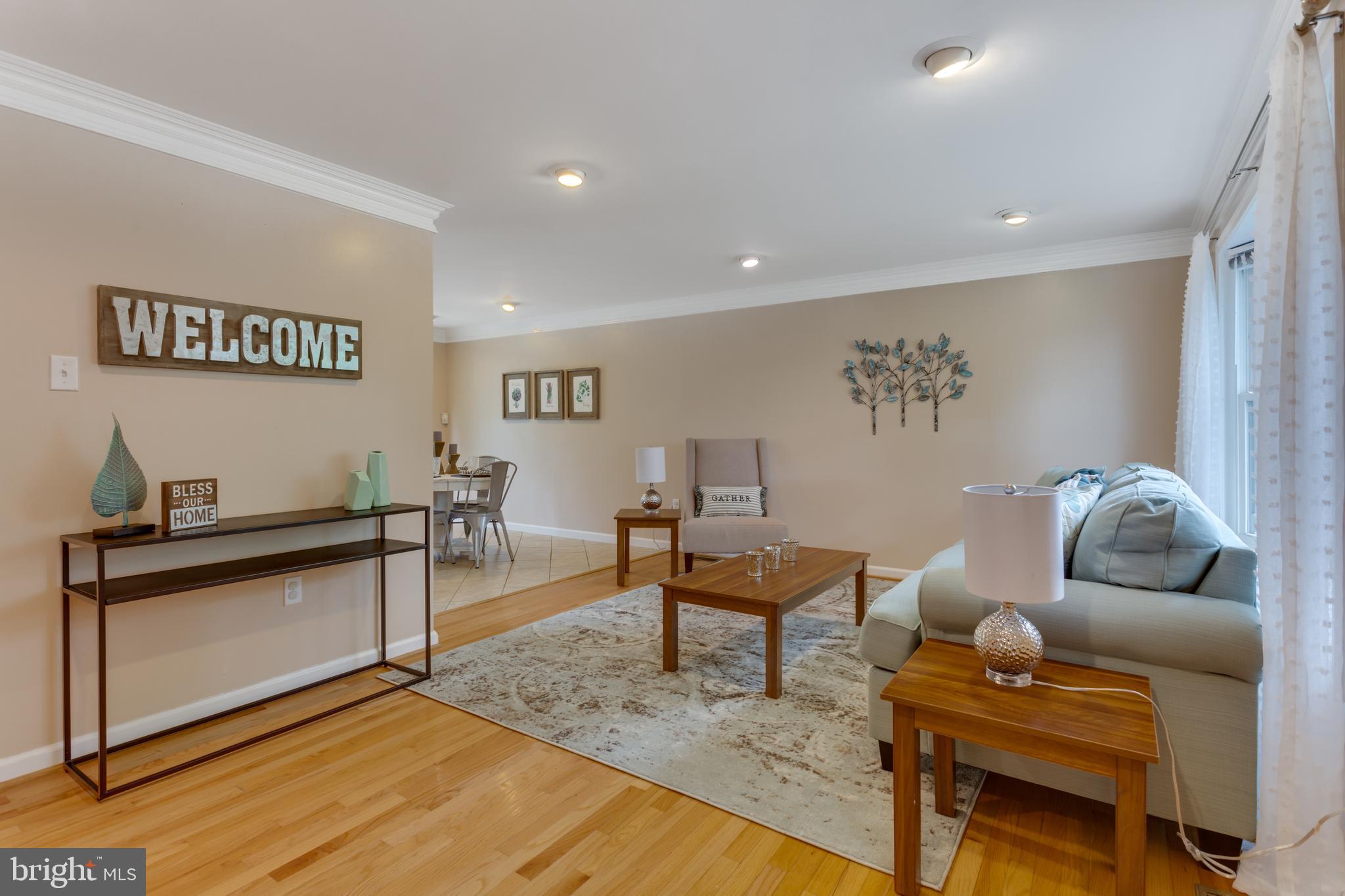 9010 Ridge Drive Fort Washington, MD 20744 - Photo 9 of 35 Entryway living room with hardwood floors