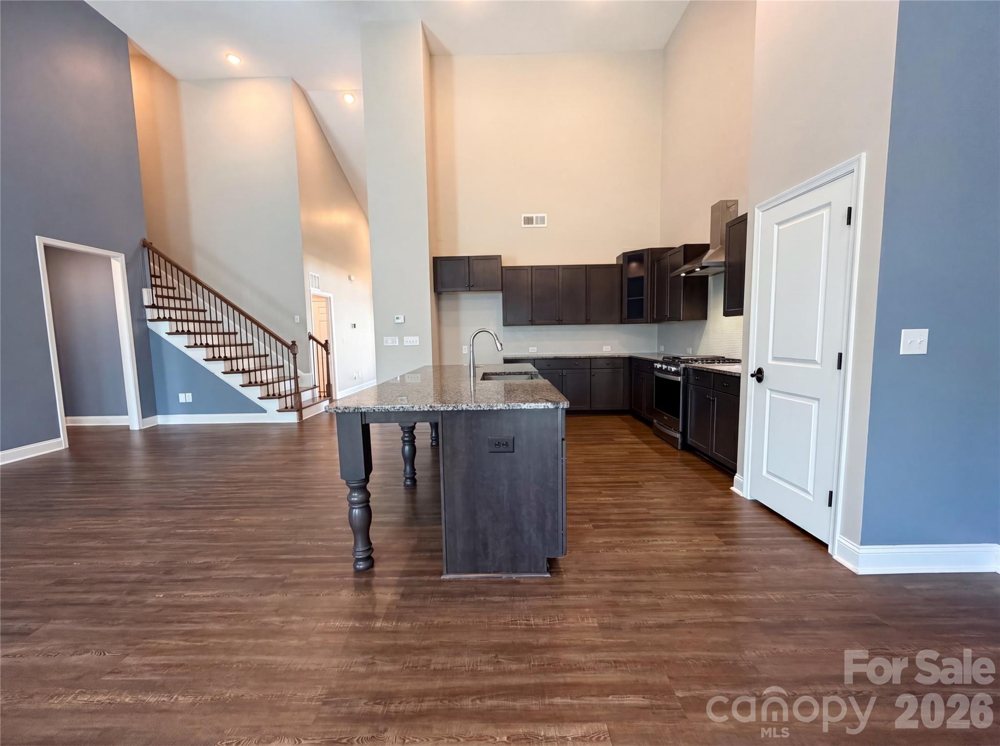 1321 Fishing Creek Road Clover, SC 29710 - Photo 6 of 19 a kitchen with stainless steel appliances granite countertop a coffee maker a sink and a refrigerator