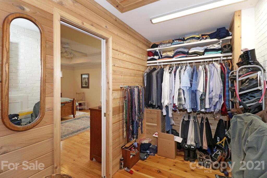 517 Old Pageland Monroe Road Monroe, NC 28112 - Photo 22 of 48 a view of walk in closet with clothes and shoes