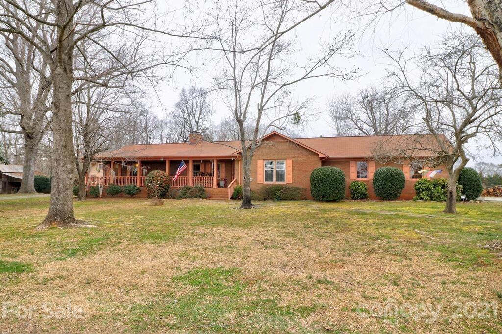 517 Old Pageland Monroe Road Monroe, NC 28112 - Photo 5 of 48 a front view of a house with a yard