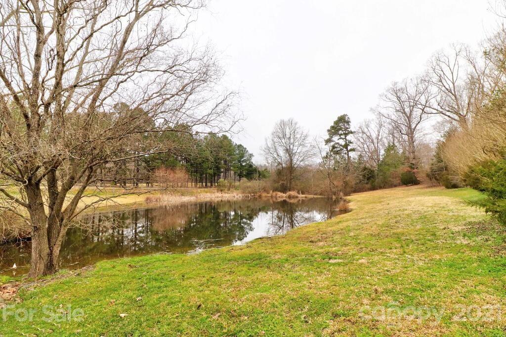 517 Old Pageland Monroe Road Monroe, NC 28112 - Photo 48 of 48 a view of lake view with large trees