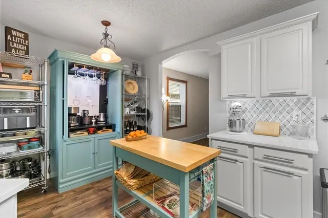 a view of a kitchen and dining room