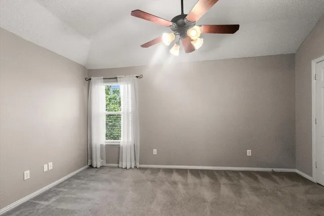 a bathroom with a sink toilet and mirror