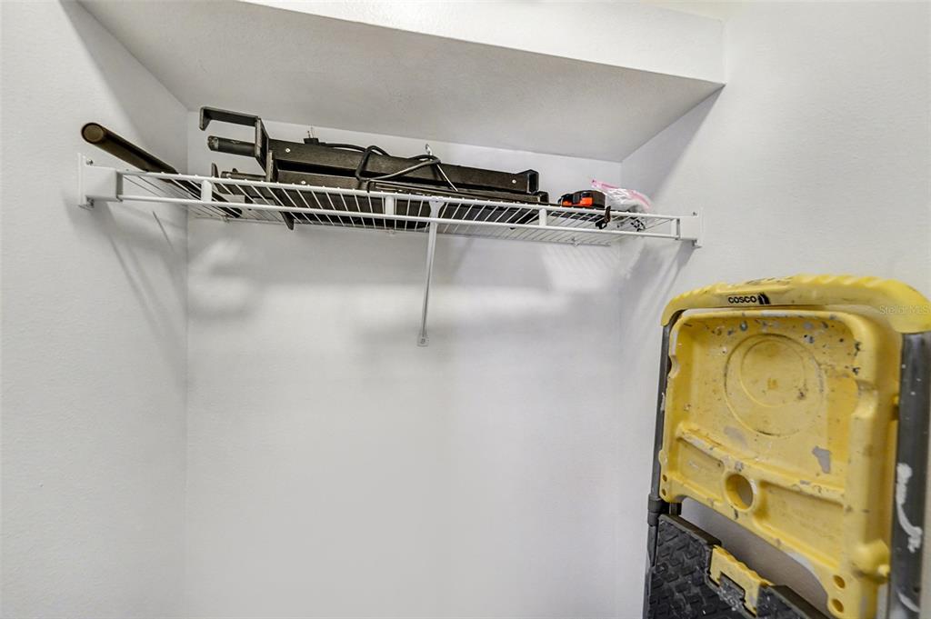 5860 Fishhawk Ridge Drive Lithia, FL 33547 - Photo 20 of 31 a view of walk in closet with clothes and shoes