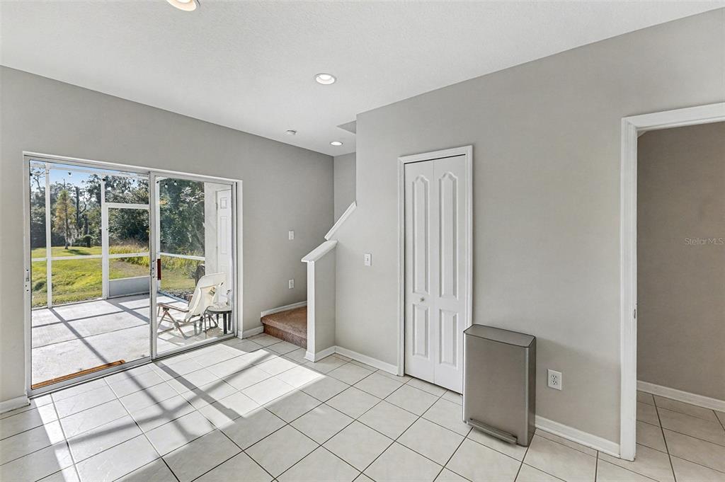 5860 Fishhawk Ridge Drive Lithia, FL 33547 - Photo 23 of 31 a view of a room with a large window and chair