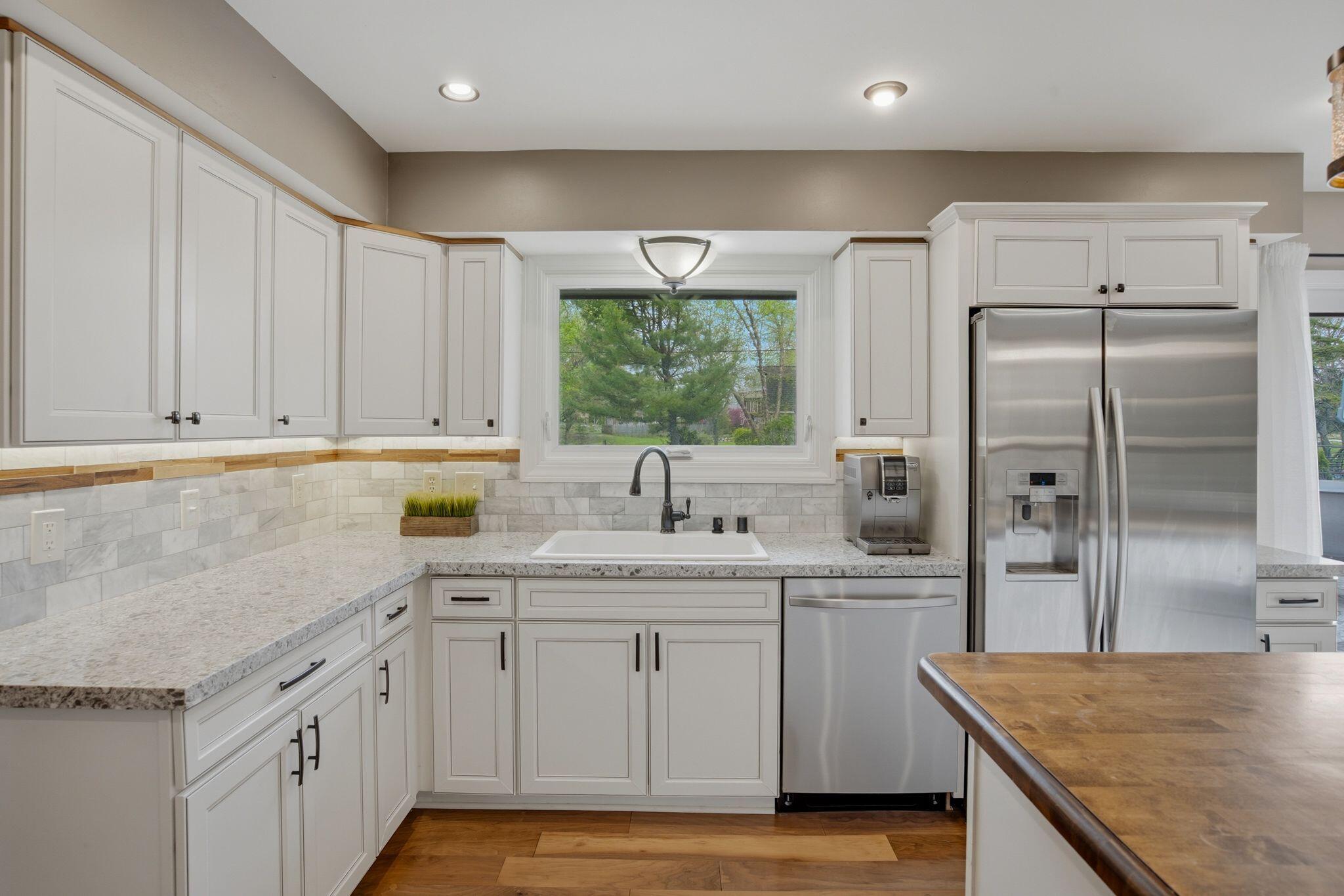 3941 South Brook Road Caledonia, WI 53126 - Photo 11 of 50 Kitchen - Island - SS Apps - Solid Surface Counters