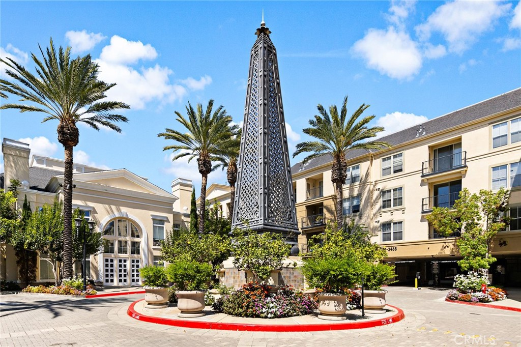 3311 Watermarke Place Irvine, CA 92612 - Photo 30 of 33 a front view of multi story residential apartment building with yard