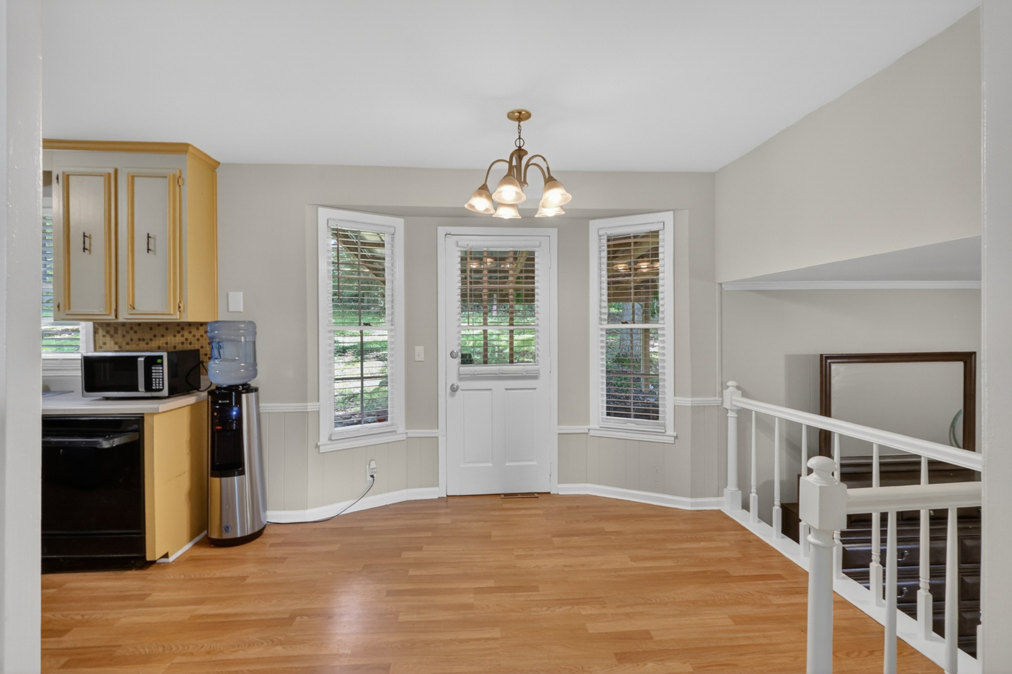 489 Canton Pass Madison, TN 37115 - Photo 19 of 25 a view of an empty room with wooden floor and a window