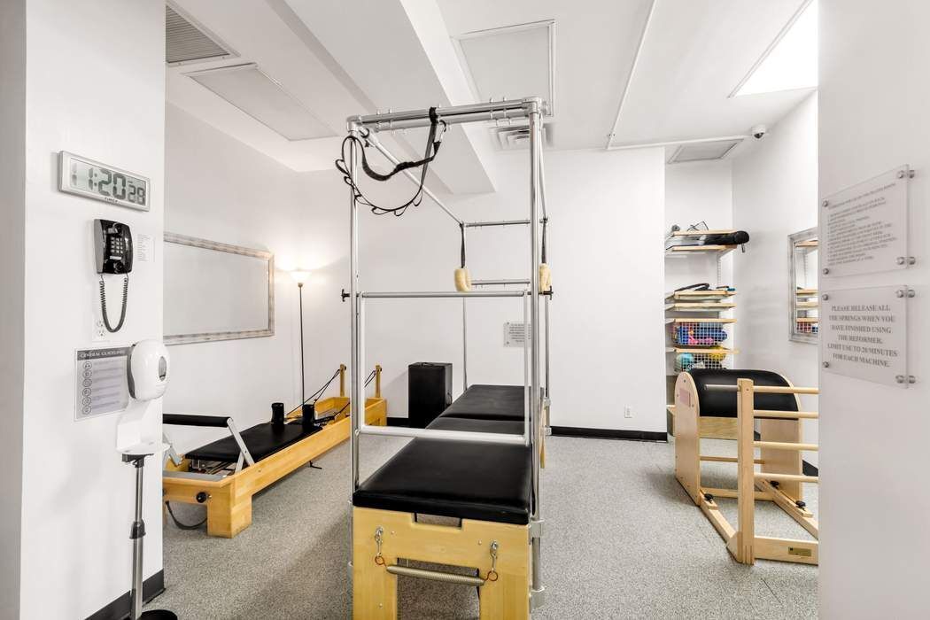 870 United Nations Plaza, Unit 28A Manhattan, NY 10017 - Photo 26 of 28 a bedroom with furniture and wooden floor